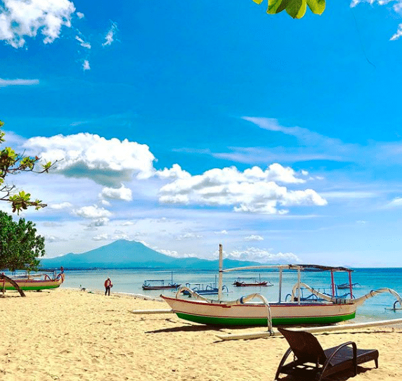 A jukung docked at the beach in Sanur, Bali.
