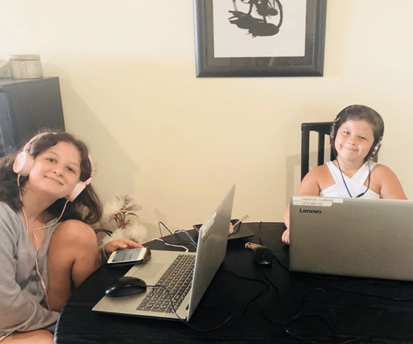 Karlie’s two daughters, home schooling online while living in Bali.