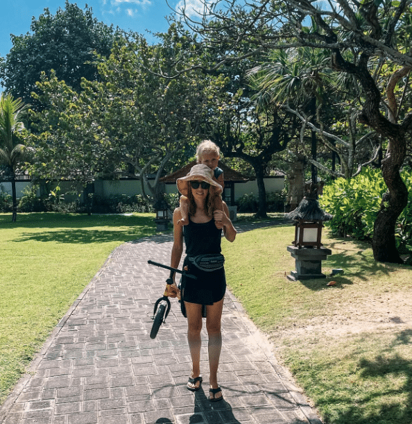 Mum and toddler in hotel gardens in Bali