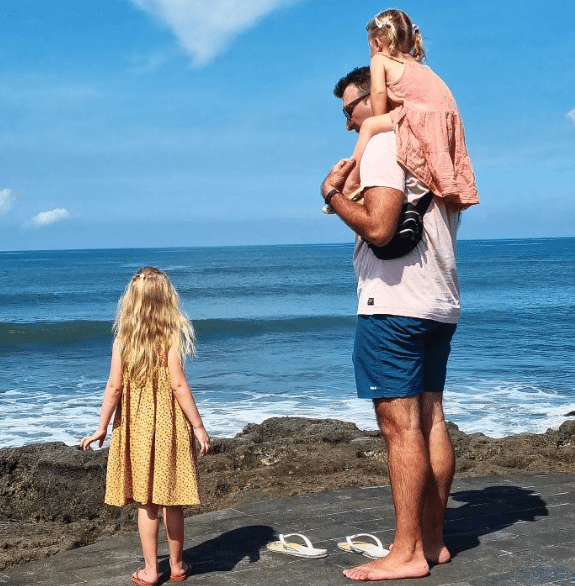 French father and daughters at Bali beach