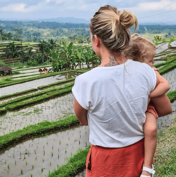 French mother and daughgter looking at the ricefields