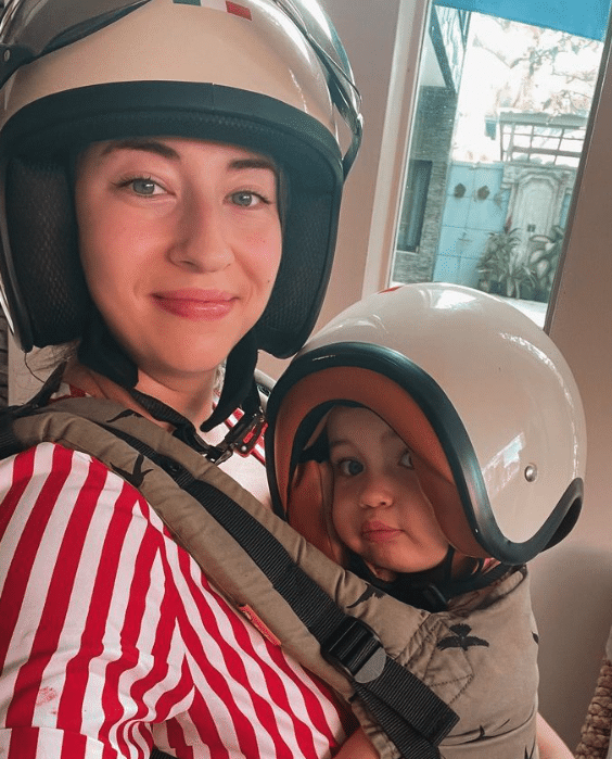 Dutch mother and daughter on scooter in Bali